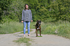 woman and German Boxer