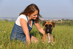 woman and German Boxer