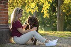 woman and German longhaired Pointer