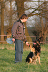 German Shepherd gives paw
