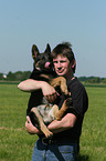 man and German Shepherd