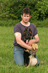 man and German Shepherd