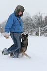 man and German Shepherd