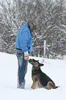 man and German Shepherd