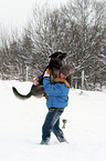 man and German Shepherd