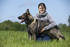 woman and GDR Shepherd