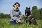 woman and GDR Shepherd