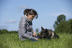 woman and GDR Shepherd