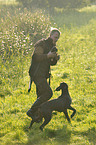 man and German shorthaired Pointer