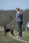 woman and German shorthaired Pointer