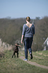woman and German shorthaired Pointer