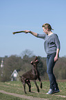 woman and German shorthaired Pointer