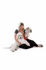 woman with Bichpoo and standard poodle