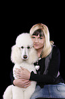 young woman with poodle