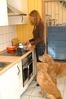 woman and golden retriever