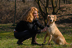 woman and golden retriever