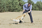 man with Golden Retriever