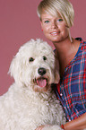 woman and Goldendoodle