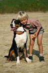 boy and Great Swiss Mountain Dog