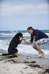 man and Great Swiss Mountain Dog