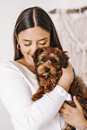 young woman with young havanese