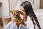 young woman with young havanese