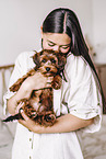young woman with young havanese