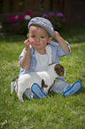 Child and Jack Russell Terrier Puppy