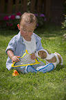 Child and Jack Russell Terrier Puppy