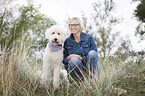 woman and Labradoodle