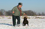 Senior playing with Labrador Retriever