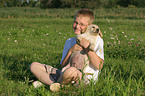 boy and Labrador Retriever Puppy