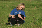 girl with Labrador Retriever Puppies