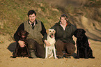 family with Labrador Retriever