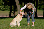 woman and Labrador Retriever