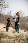 woman and Labrador Retriever