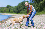 woman with Labrador Retriever