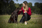 woman with Labrador Retriever