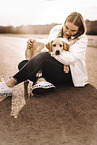 woman and Labrador Retriever Puppy