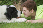 woman and Landseer Puppy