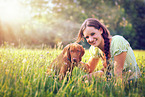 woman and Magyar Vizsla Puppy