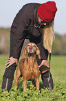 woman with Magyar Vizsla