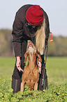 woman with Magyar Vizsla