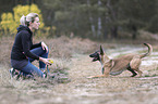 young woman with Malinois
