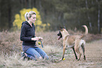 young woman with Malinois
