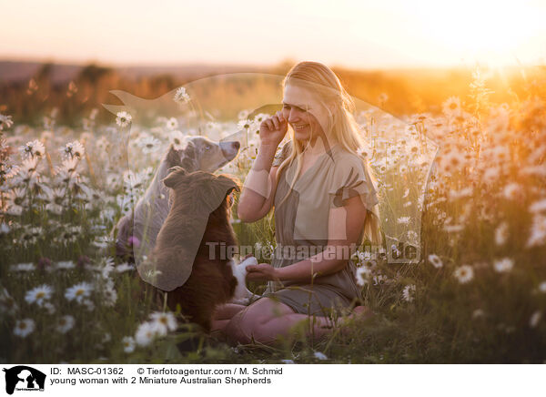 young woman with 2 Miniature Australian Shepherds / MASC-01362