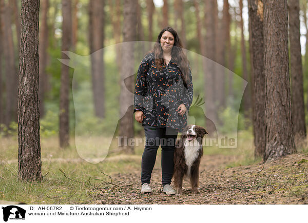 woman and Miniature Australian Shepherd / AH-06782
