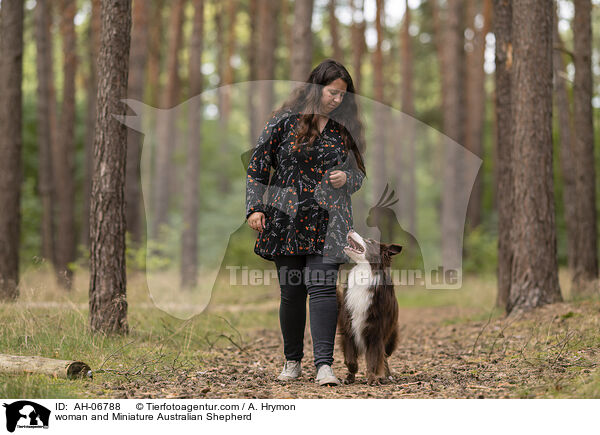 woman and Miniature Australian Shepherd / AH-06788