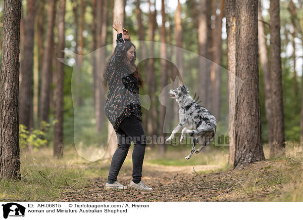 woman and Miniature Australian Shepherd / AH-06815