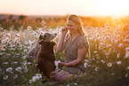 young woman with 2 Miniature Australian Shepherds